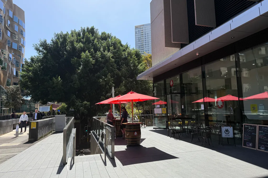 A photo of the outdoor seating and sunshade in front of Cafe Japanon