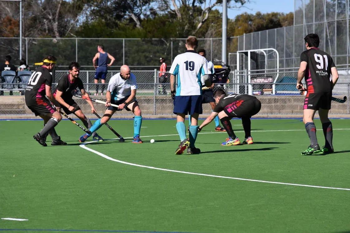 UTS Hockey team playing a match against Macquarie University