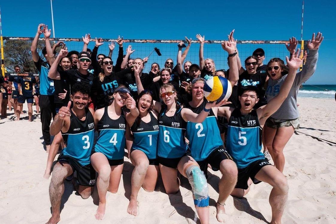 UTS Volleyball members playing beach volleyball